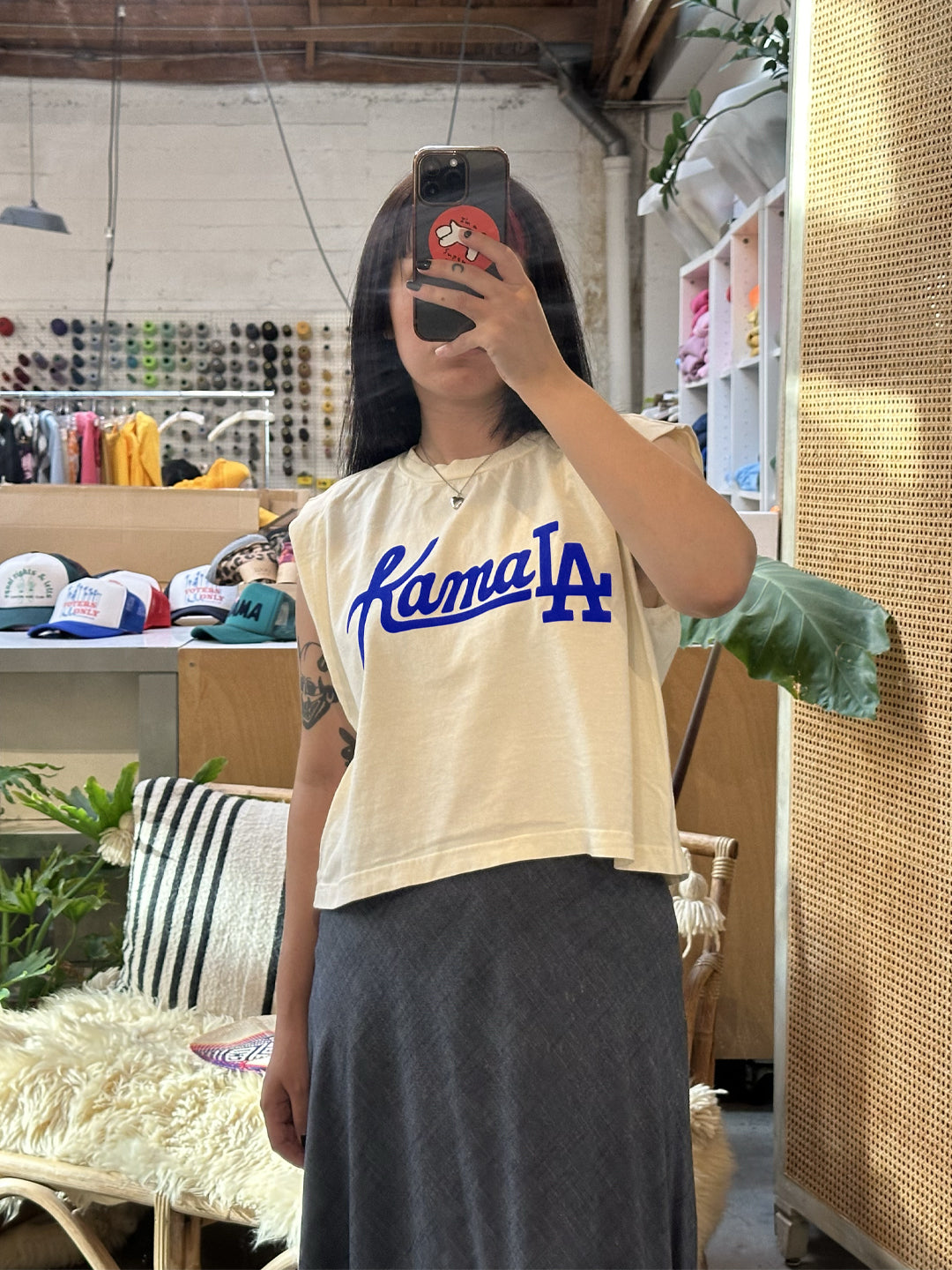 Womens Cropped Muscle Tee in Ivory with cobalt blue flocking vinyl KamaLA at the chest